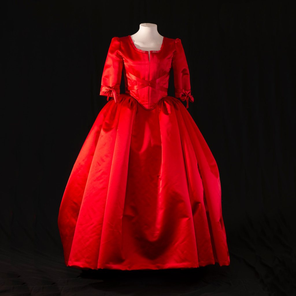 A beautiful red satin dress in an 18th century style